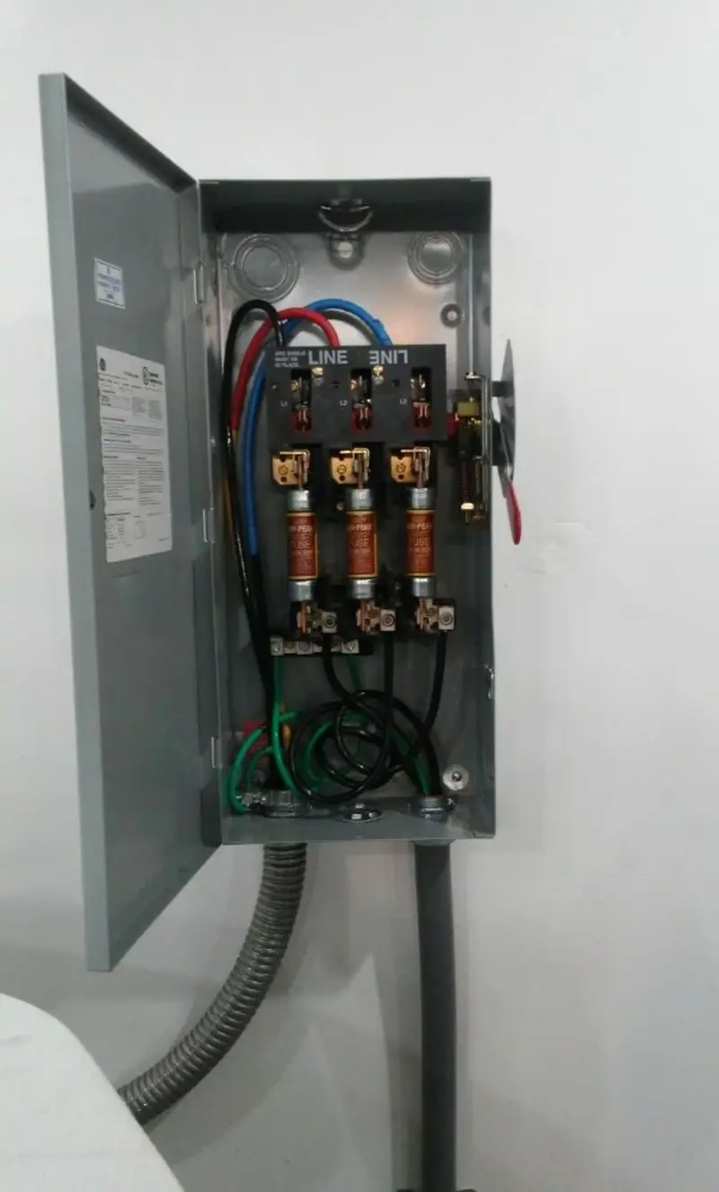 Three-phase disconnect switch installed for Smoke Detector Installation in Junction City