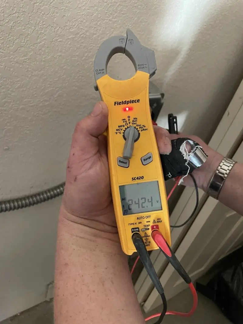 Voltage testing with clamp meter during Generator Installation in Junction City